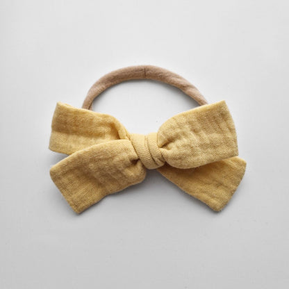 Muslina matu bantes ap galviņu liekamās - 16 krāsās