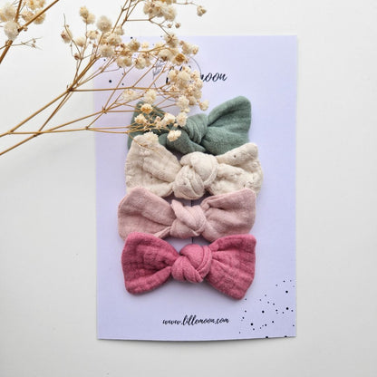 Muslina matu sprādzīšu komplekts meitenēm – 4 pasteļtoņu bantītes