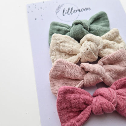 Muslina matu sprādzīšu komplekts meitenēm – 4 pasteļtoņu bantītes