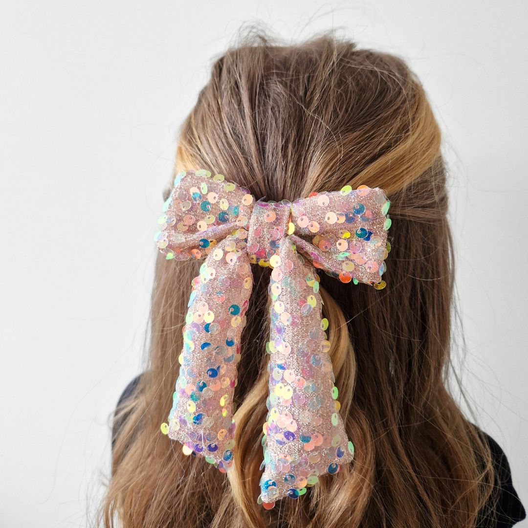 Glitteru varavīksnes matu bante svētkiem | Ierobežots daudzums