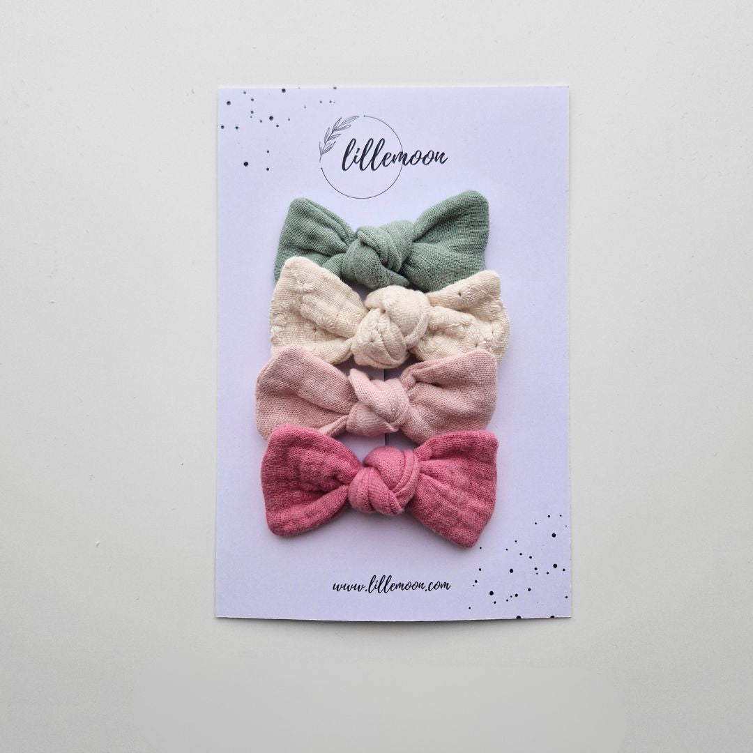 Muslina matu sprādzīšu komplekts meitenēm – 4 pasteļtoņu bantītes