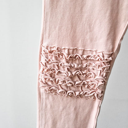 Pre-Loved Legingi – Maigi rozā ar volāniem | 116 izm.