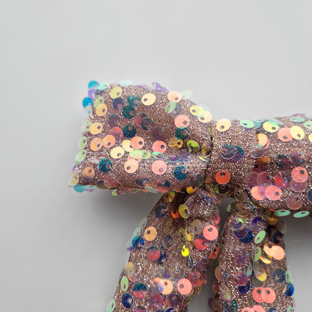 Glitteru varavīksnes matu bante svētkiem | Ierobežots daudzums