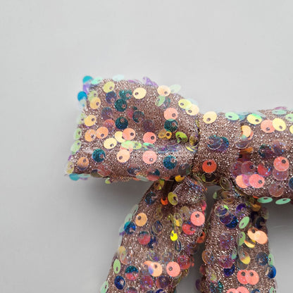 Glitteru varavīksnes matu bante svētkiem | Ierobežots daudzums