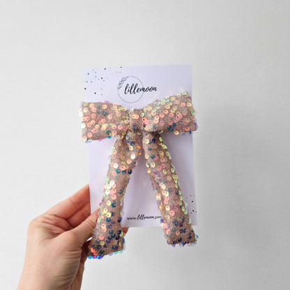 Glitteru varavīksnes matu bante svētkiem | Ierobežots daudzums