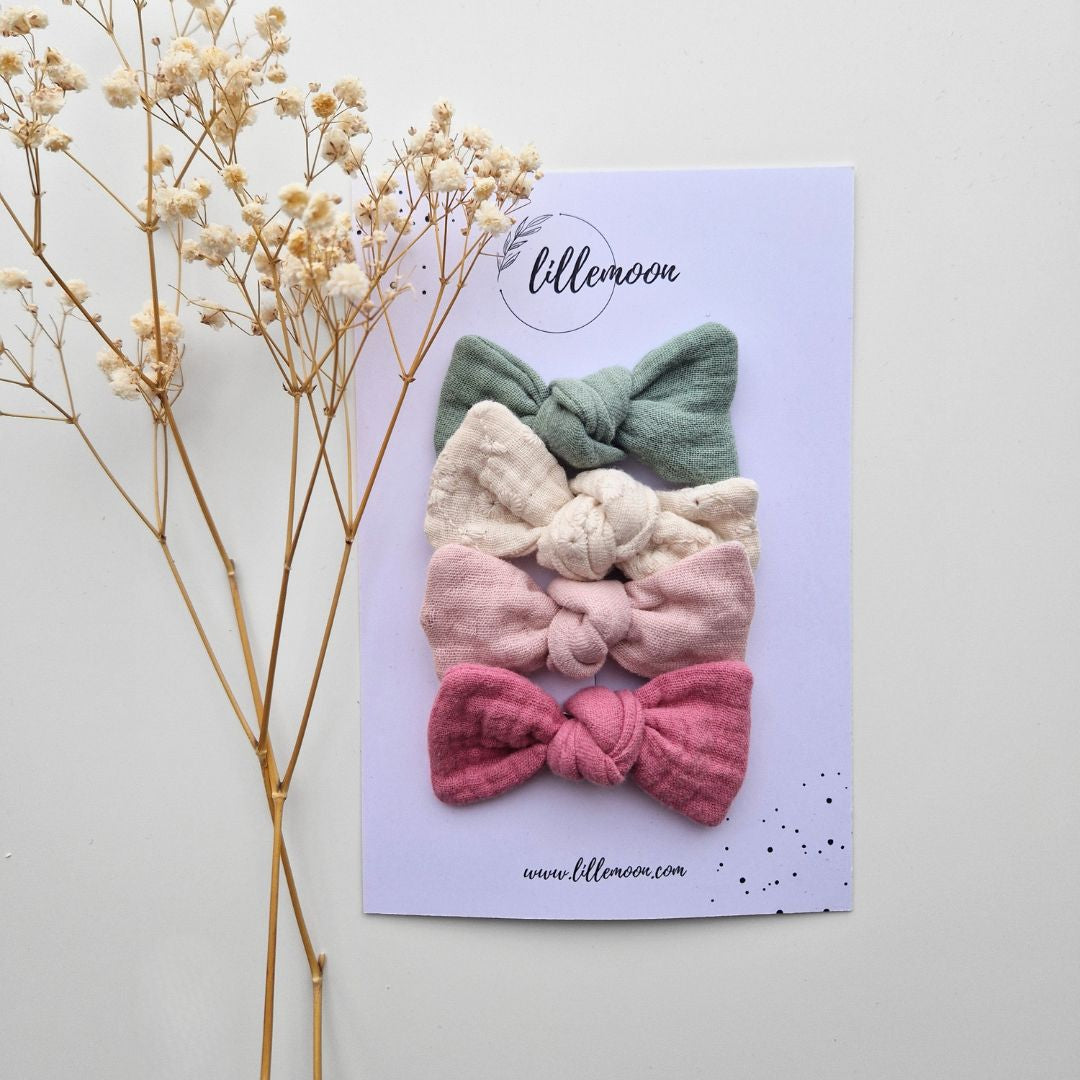 Muslina matu sprādzīšu komplekts meitenēm – 4 pasteļtoņu bantītes