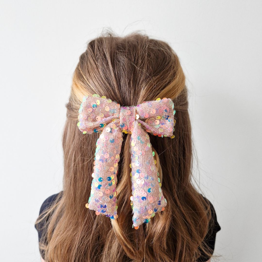 Glitteru varavīksnes matu bante svētkiem | Ierobežots daudzums