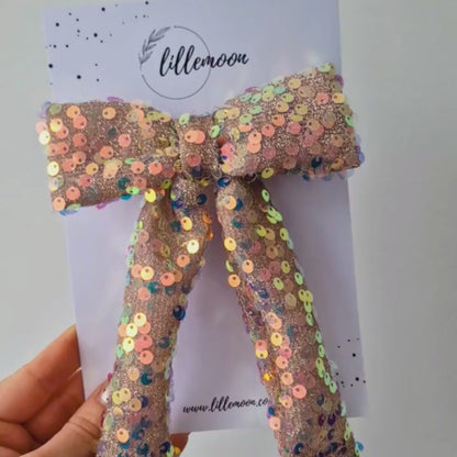 Glitteru varavīksnes matu bante svētkiem | Ierobežots daudzums